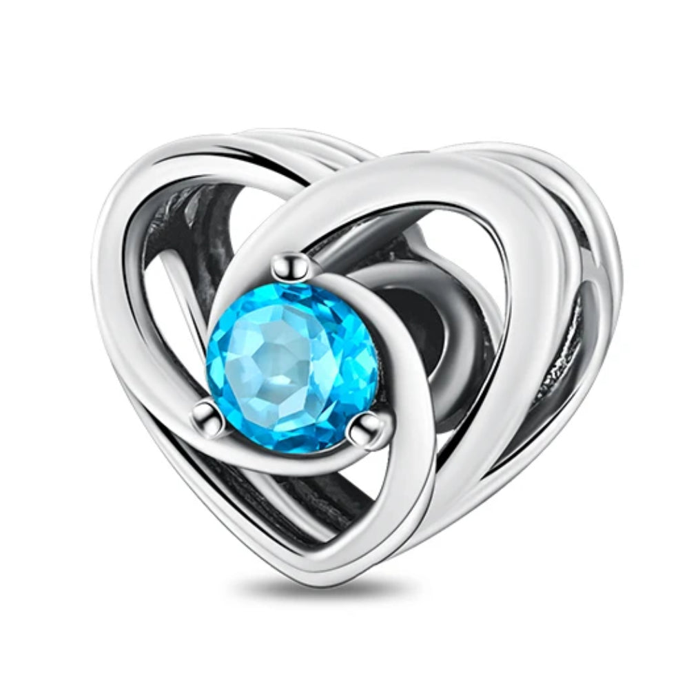 Silberner Herz-Charm mit blauem Kristall