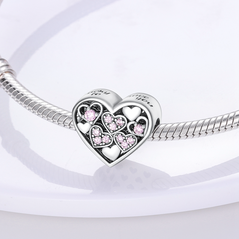Herz an Herz – Charm mit rosa Zirkonia